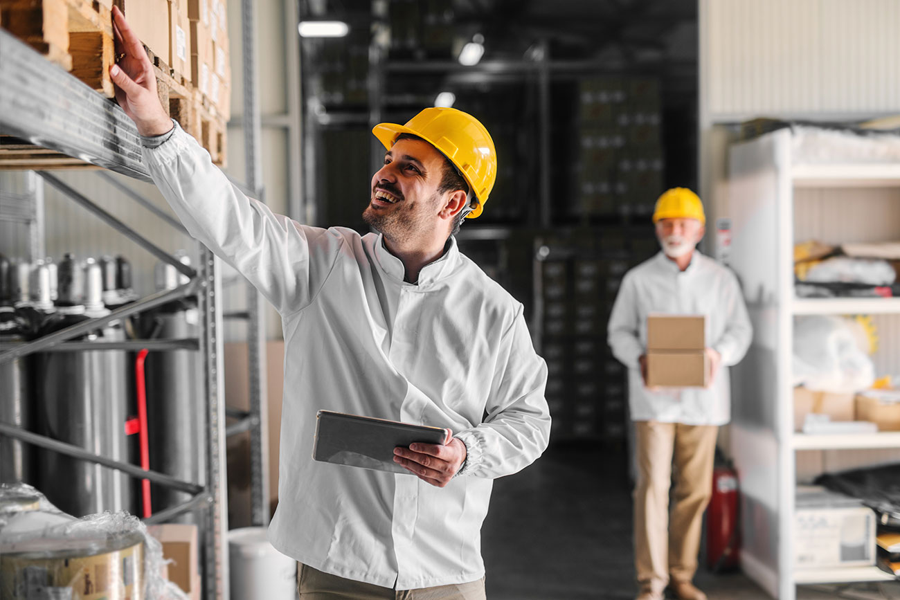 Two men in a warehouse